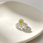 Pear cut lab grown yellow diamond engagement ring 01