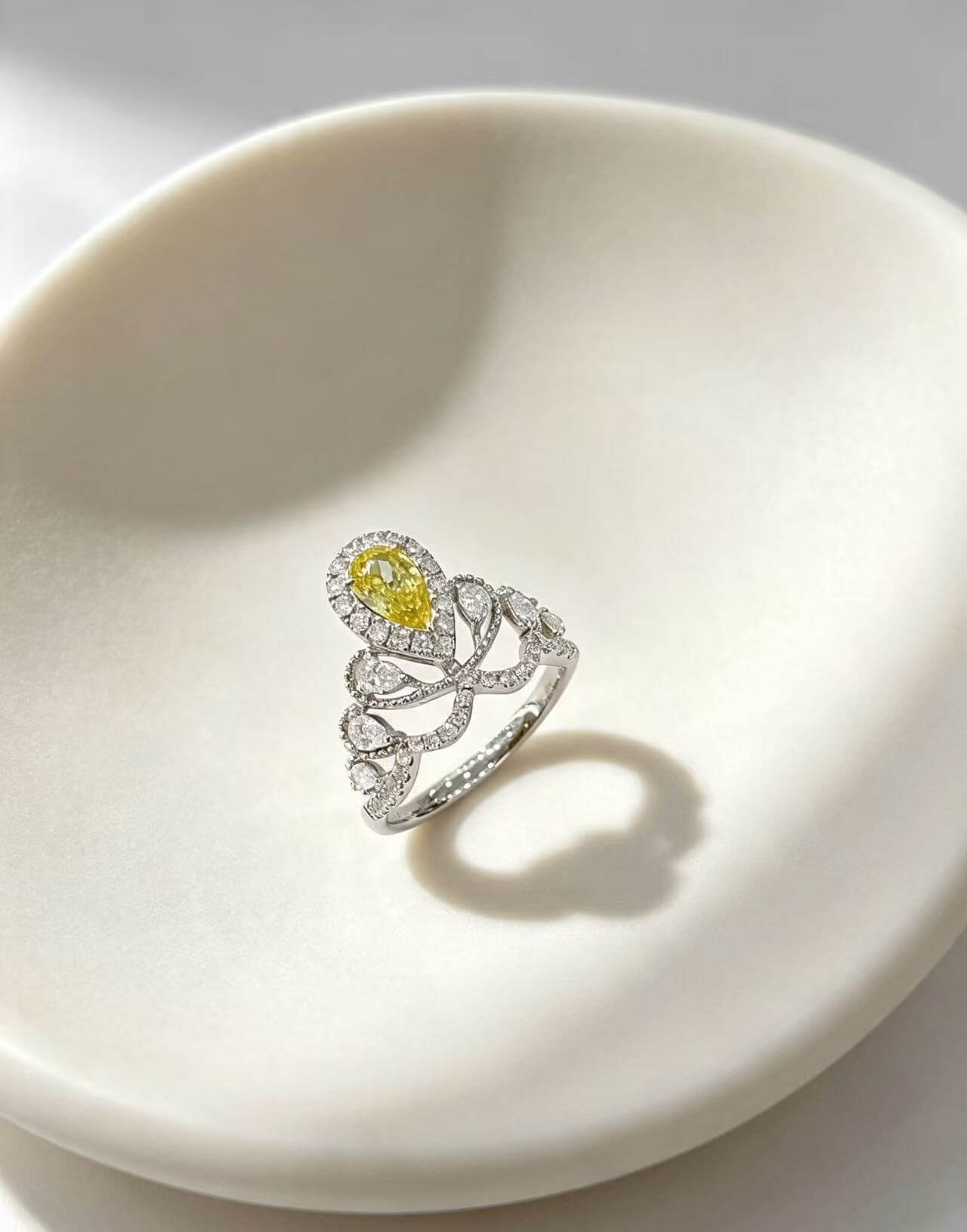 Pear cut lab grown yellow diamond engagement ring 01