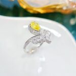 Pear cut lab grown yellow diamond engagement ring 02