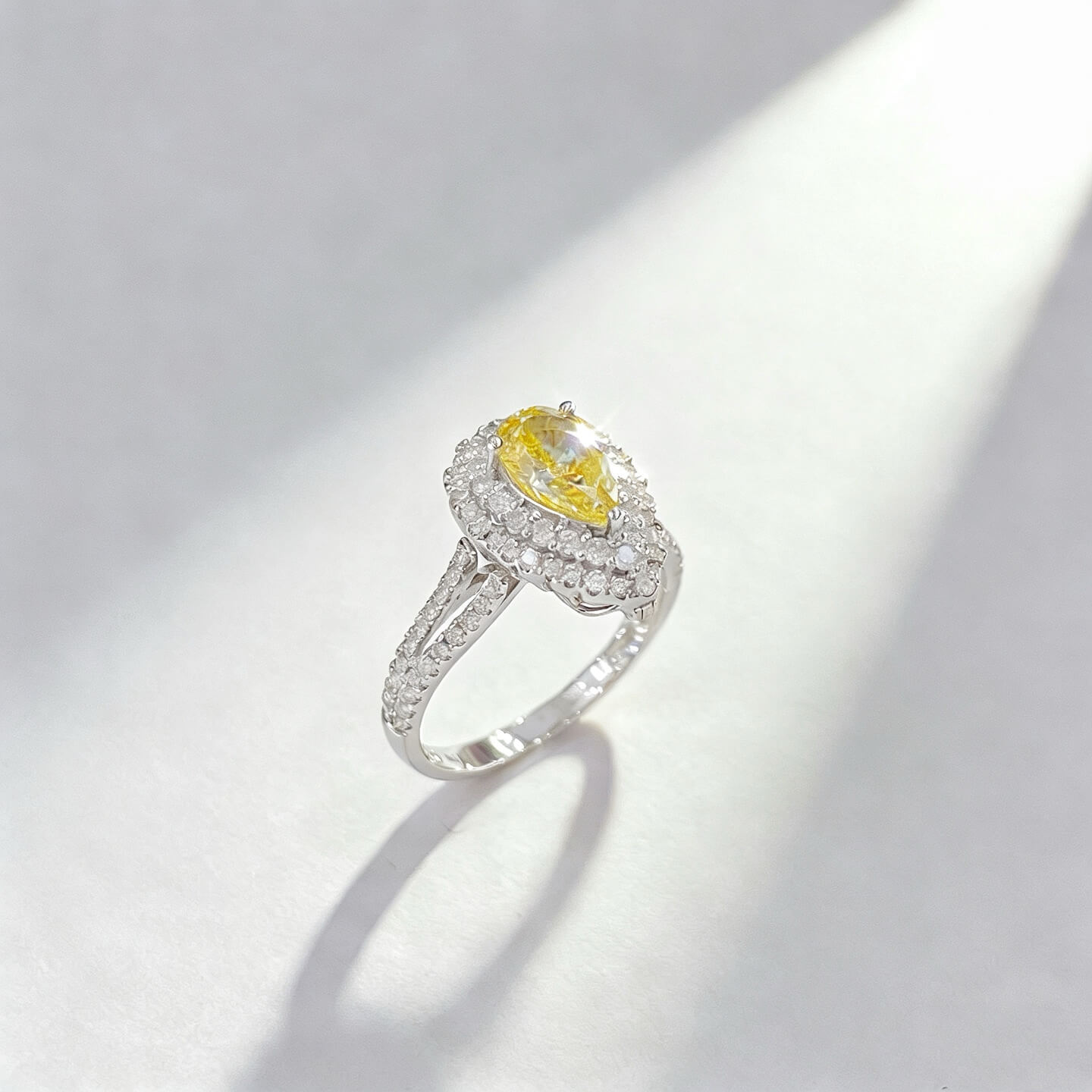 Pear cut lab grown yellow diamond engagement ring 04 Pear cut lab grown yellow diamond engagement ring 04