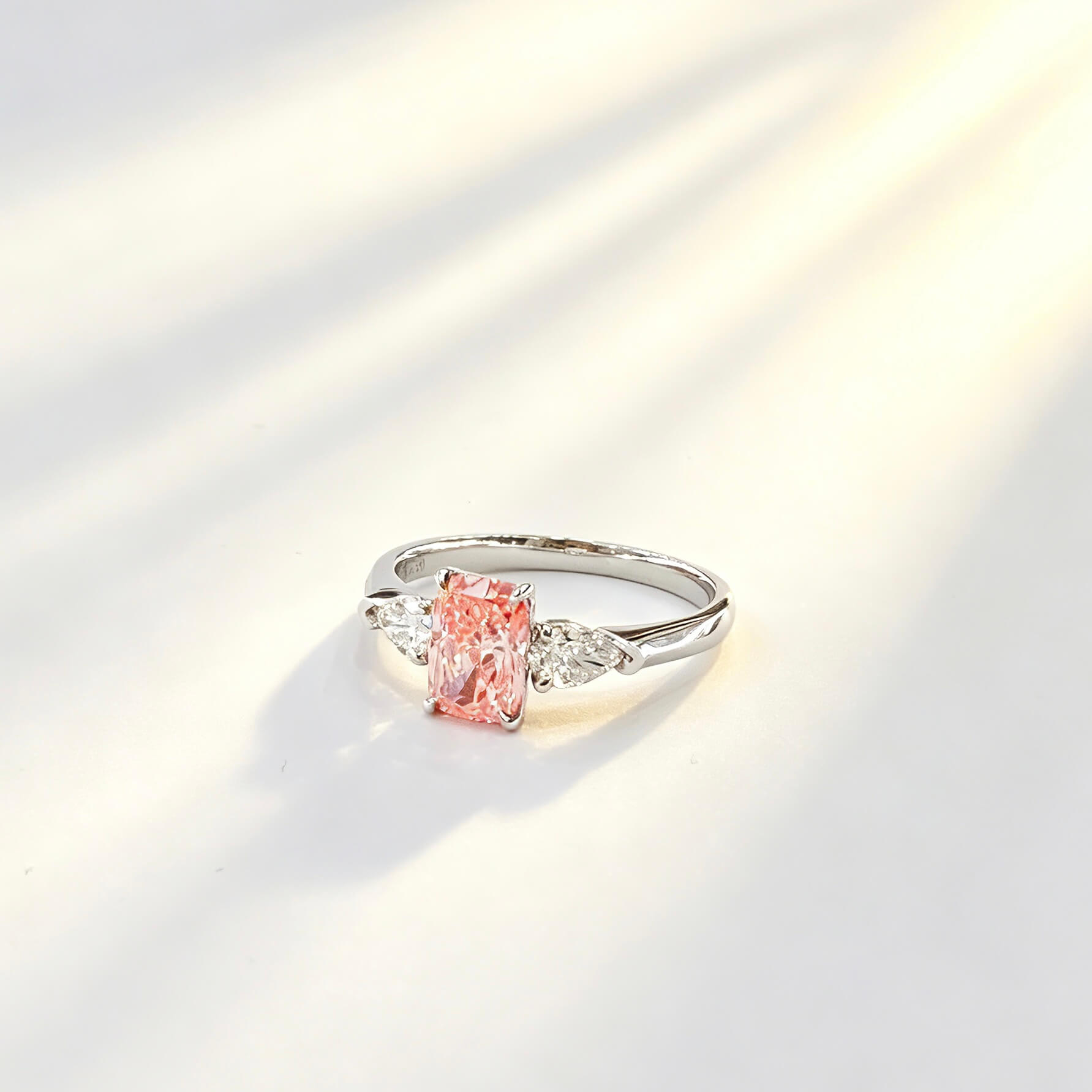 Radiant cut lab grown pink diamond three stones engagement ring 02