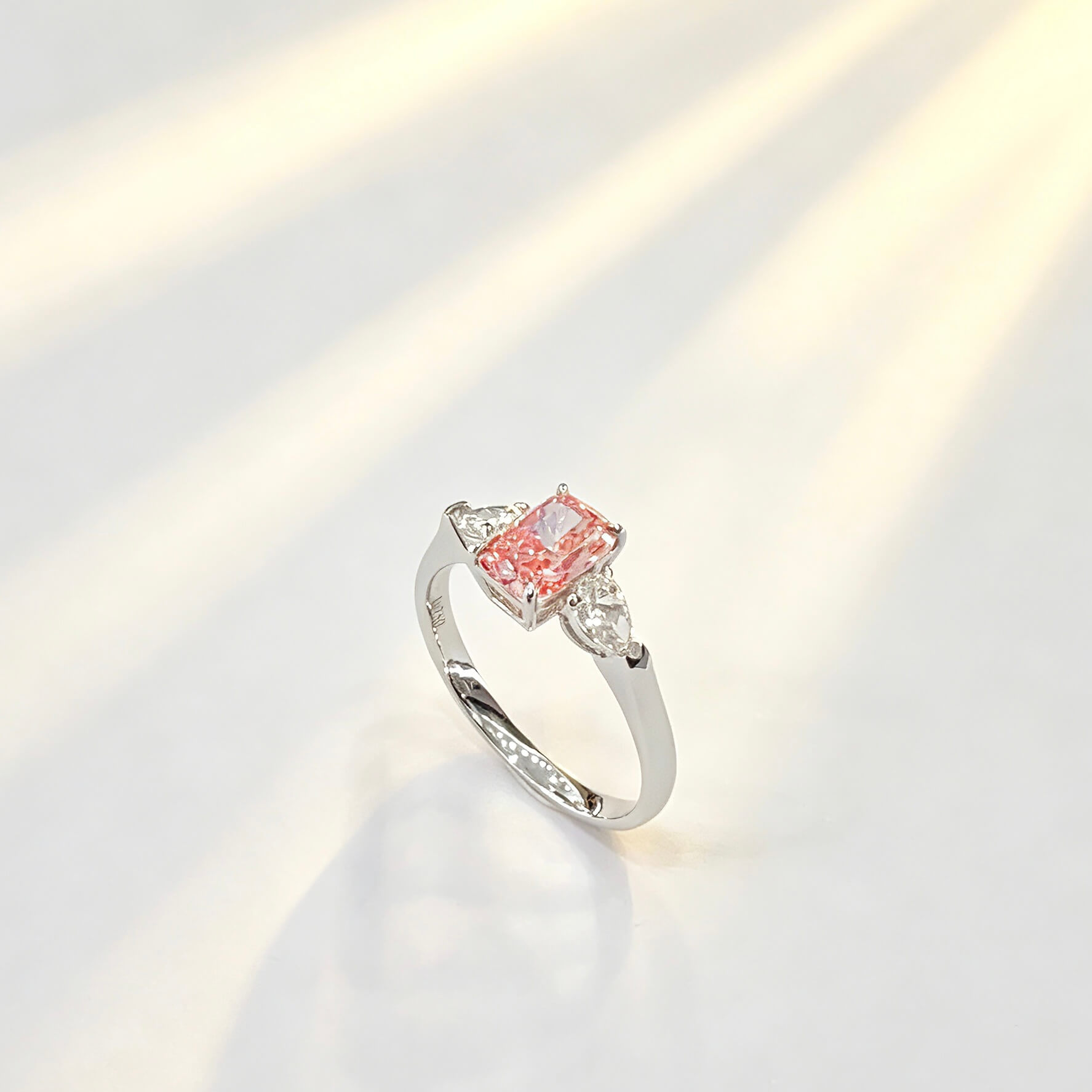 Radiant cut lab grown pink diamond three stones engagement ring 02